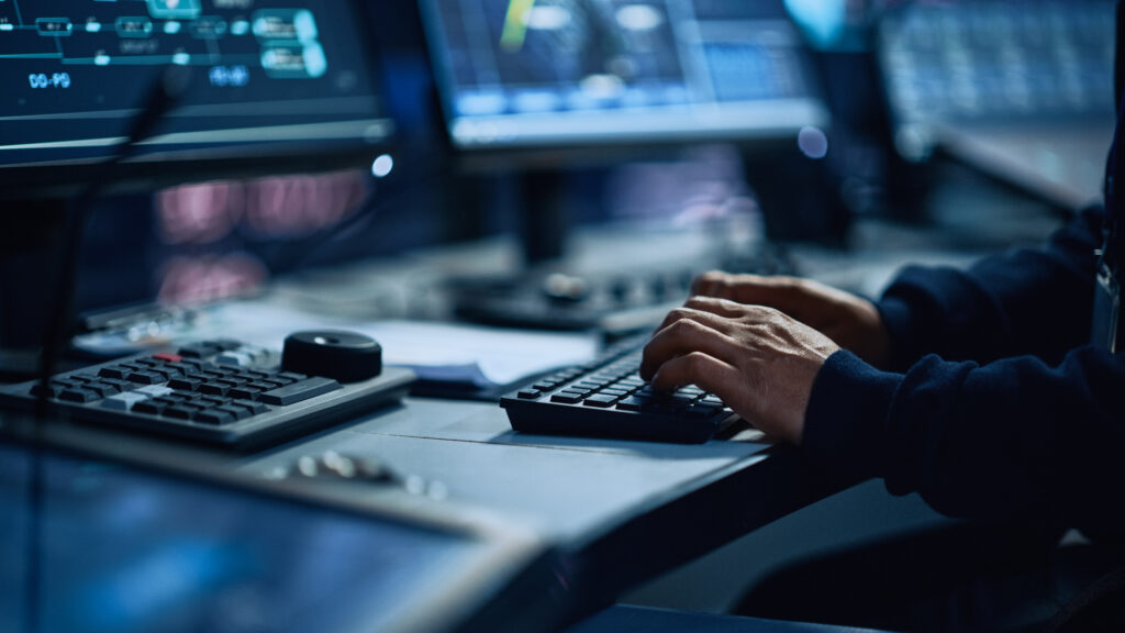 Close Up of a Professional Office Specialist Working on Desktop