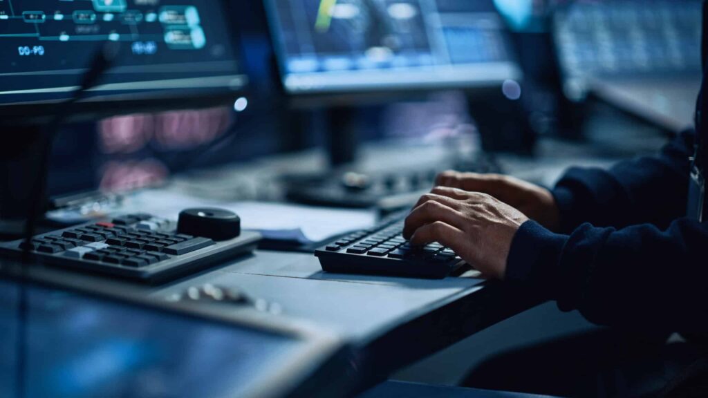 Close Up of a Professional Office Specialist Working on Desktop
